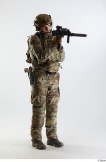 Frankie Perry Shooting 2 aiming gun standing whole body 0008.jpg